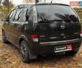 Черный Опель Мерива, объемом двигателя 1.6 л и пробегом 262 тыс. км за 4740 $, фото 11 на Automoto.ua