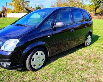 Черный Опель Мерива, объемом двигателя 1.4 л и пробегом 184 тыс. км за 5000 $, фото 1 на Automoto.ua