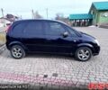 Черный Опель Мерива, объемом двигателя 1.6 л и пробегом 255 тыс. км за 3100 $, фото 2 на Automoto.ua