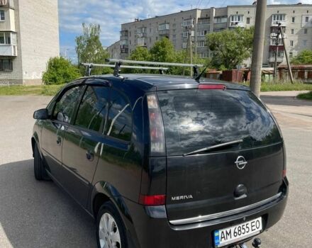 Черный Опель Мерива, объемом двигателя 1.4 л и пробегом 220 тыс. км за 5300 $, фото 4 на Automoto.ua