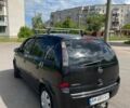 Черный Опель Мерива, объемом двигателя 1.4 л и пробегом 220 тыс. км за 5300 $, фото 4 на Automoto.ua