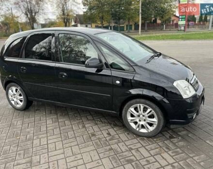 Черный Опель Мерива, объемом двигателя 1.6 л и пробегом 149 тыс. км за 4150 $, фото 7 на Automoto.ua
