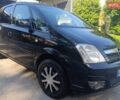 Черный Опель Мерива, объемом двигателя 1.4 л и пробегом 277 тыс. км за 3650 $, фото 1 на Automoto.ua