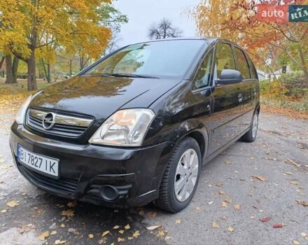 Черный Опель Мерива, объемом двигателя 1.6 л и пробегом 150 тыс. км за 5400 $, фото 1 на Automoto.ua