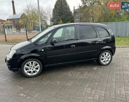 Черный Опель Мерива, объемом двигателя 1.6 л и пробегом 149 тыс. км за 4150 $, фото 2 на Automoto.ua