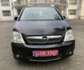Черный Опель Мерива, объемом двигателя 1.6 л и пробегом 251 тыс. км за 5999 $, фото 1 на Automoto.ua