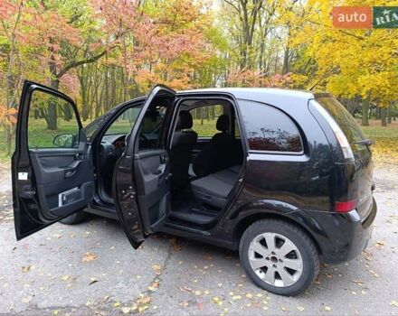 Черный Опель Мерива, объемом двигателя 1.6 л и пробегом 150 тыс. км за 5400 $, фото 12 на Automoto.ua