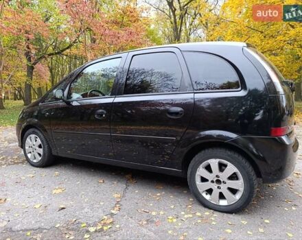 Черный Опель Мерива, объемом двигателя 1.6 л и пробегом 150 тыс. км за 5400 $, фото 2 на Automoto.ua