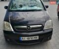 Черный Опель Мерива, объемом двигателя 1.6 л и пробегом 198 тыс. км за 4700 $, фото 1 на Automoto.ua