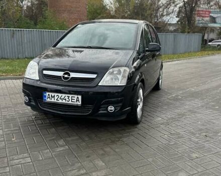 Черный Опель Мерива, объемом двигателя 1.6 л и пробегом 149 тыс. км за 4150 $, фото 1 на Automoto.ua