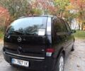 Черный Опель Мерива, объемом двигателя 1.6 л и пробегом 150 тыс. км за 5400 $, фото 5 на Automoto.ua