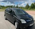 Черный Опель Мерива, объемом двигателя 1.4 л и пробегом 220 тыс. км за 5300 $, фото 2 на Automoto.ua