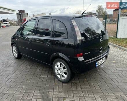 Черный Опель Мерива, объемом двигателя 1.6 л и пробегом 149 тыс. км за 4150 $, фото 3 на Automoto.ua