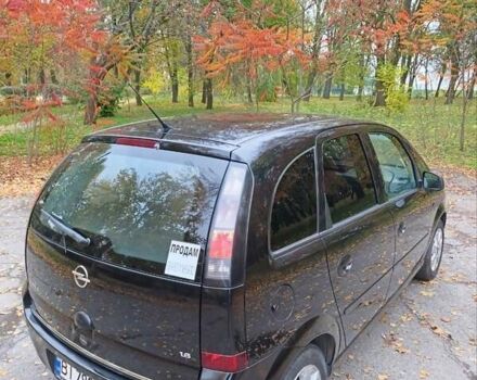 Черный Опель Мерива, объемом двигателя 1.6 л и пробегом 150 тыс. км за 5400 $, фото 7 на Automoto.ua