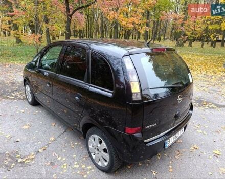 Черный Опель Мерива, объемом двигателя 1.6 л и пробегом 150 тыс. км за 5400 $, фото 3 на Automoto.ua