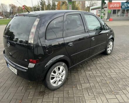 Черный Опель Мерива, объемом двигателя 1.6 л и пробегом 149 тыс. км за 4500 $, фото 6 на Automoto.ua