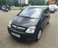 Черный Опель Мерива, объемом двигателя 1.4 л и пробегом 145 тыс. км за 3990 $, фото 1 на Automoto.ua