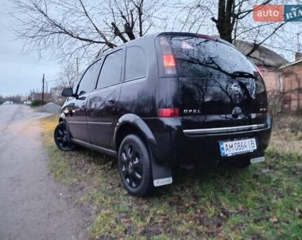 Черный Опель Мерива, объемом двигателя 1.6 л и пробегом 145 тыс. км за 3850 $, фото 12 на Automoto.ua