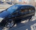 Черный Опель Мерива, объемом двигателя 1.7 л и пробегом 222 тыс. км за 4450 $, фото 1 на Automoto.ua