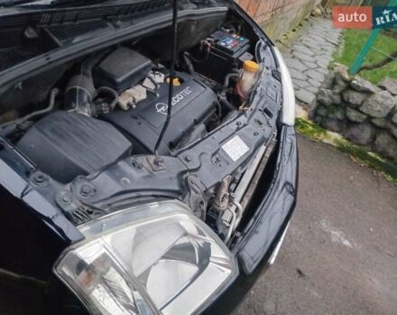 Черный Опель Мерива, объемом двигателя 1.6 л и пробегом 145 тыс. км за 3850 $, фото 19 на Automoto.ua