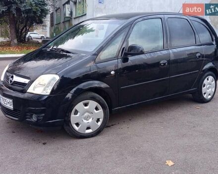 Черный Опель Мерива, объемом двигателя 1.6 л и пробегом 177 тыс. км за 4899 $, фото 1 на Automoto.ua