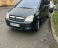 Черный Опель Мерива, объемом двигателя 1.6 л и пробегом 158 тыс. км за 4500 $, фото 1 на Automoto.ua