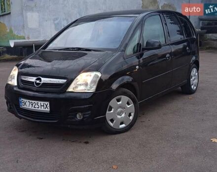 Черный Опель Мерива, объемом двигателя 1.6 л и пробегом 177 тыс. км за 4899 $, фото 4 на Automoto.ua