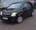 Черный Опель Мерива, объемом двигателя 1.6 л и пробегом 177 тыс. км за 4899 $, фото 4 на Automoto.ua