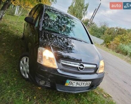 Черный Опель Мерива, объемом двигателя 1.6 л и пробегом 145 тыс. км за 2350 $, фото 1 на Automoto.ua
