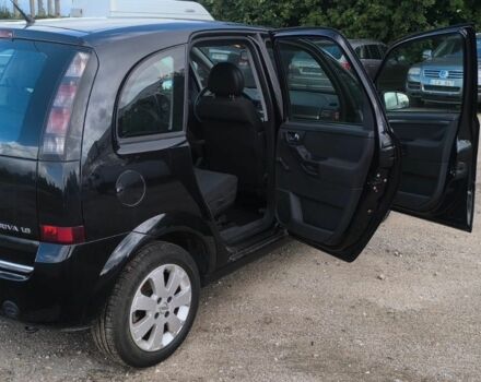 Черный Опель Мерива, объемом двигателя 1.6 л и пробегом 215 тыс. км за 1899 $, фото 2 на Automoto.ua