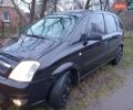 Черный Опель Мерива, объемом двигателя 1.6 л и пробегом 145 тыс. км за 3850 $, фото 8 на Automoto.ua