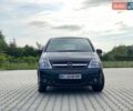 Черный Опель Мерива, объемом двигателя 1.36 л и пробегом 247 тыс. км за 3700 $, фото 1 на Automoto.ua