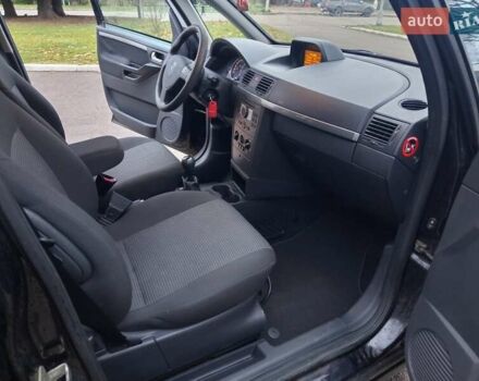 Черный Опель Мерива, объемом двигателя 1.6 л и пробегом 177 тыс. км за 4899 $, фото 27 на Automoto.ua