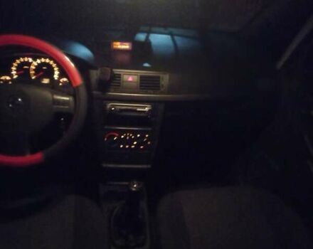 Черный Опель Мерива, объемом двигателя 1.6 л и пробегом 145 тыс. км за 3850 $, фото 16 на Automoto.ua