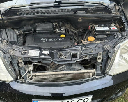 Черный Опель Мерива, объемом двигателя 1.6 л и пробегом 158 тыс. км за 4500 $, фото 16 на Automoto.ua