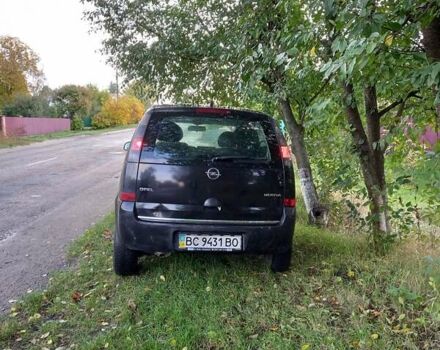 Черный Опель Мерива, объемом двигателя 1.6 л и пробегом 145 тыс. км за 2350 $, фото 14 на Automoto.ua