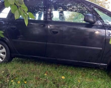 Черный Опель Мерива, объемом двигателя 1.6 л и пробегом 145 тыс. км за 2350 $, фото 12 на Automoto.ua