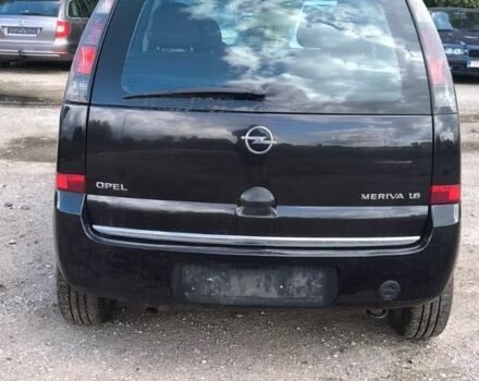 Черный Опель Мерива, объемом двигателя 1.6 л и пробегом 215 тыс. км за 1899 $, фото 1 на Automoto.ua