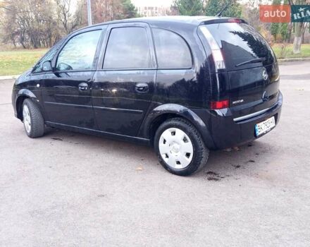Черный Опель Мерива, объемом двигателя 1.6 л и пробегом 177 тыс. км за 4899 $, фото 2 на Automoto.ua