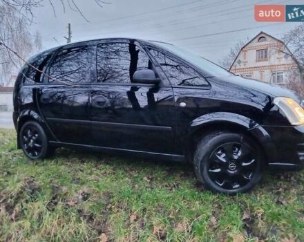 Черный Опель Мерива, объемом двигателя 1.6 л и пробегом 145 тыс. км за 3850 $, фото 6 на Automoto.ua