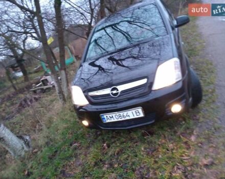 Черный Опель Мерива, объемом двигателя 1.6 л и пробегом 145 тыс. км за 3850 $, фото 1 на Automoto.ua