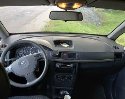 Черный Опель Мерива, объемом двигателя 1.6 л и пробегом 145 тыс. км за 2350 $, фото 7 на Automoto.ua