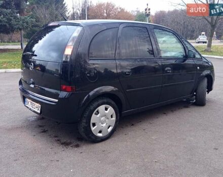 Черный Опель Мерива, объемом двигателя 1.6 л и пробегом 177 тыс. км за 4899 $, фото 7 на Automoto.ua
