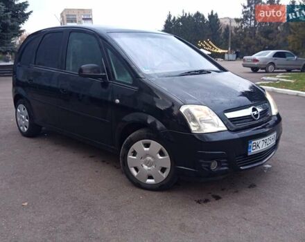 Черный Опель Мерива, объемом двигателя 1.6 л и пробегом 177 тыс. км за 4899 $, фото 6 на Automoto.ua