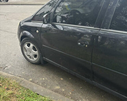 Черный Опель Мерива, объемом двигателя 1.6 л и пробегом 158 тыс. км за 4500 $, фото 13 на Automoto.ua