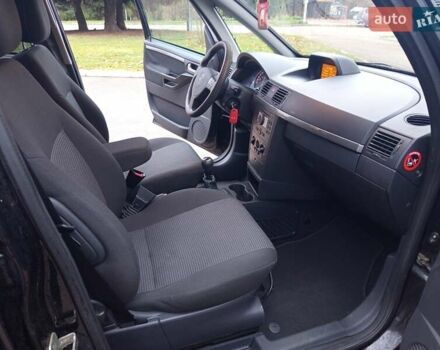 Черный Опель Мерива, объемом двигателя 1.6 л и пробегом 177 тыс. км за 4899 $, фото 25 на Automoto.ua