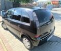 Черный Опель Мерива, объемом двигателя 1.6 л и пробегом 224 тыс. км за 4200 $, фото 10 на Automoto.ua