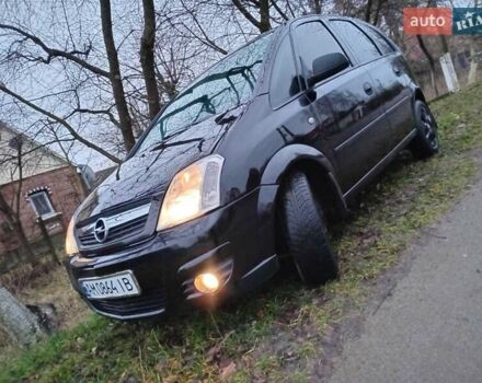 Черный Опель Мерива, объемом двигателя 1.6 л и пробегом 145 тыс. км за 3850 $, фото 4 на Automoto.ua