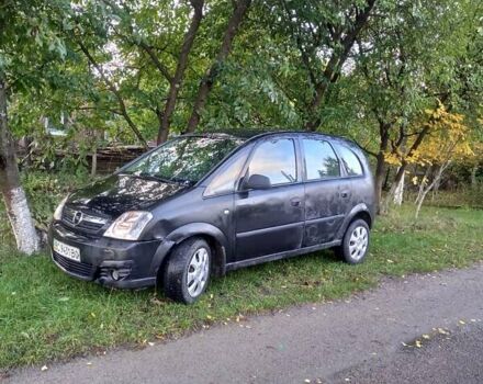 Черный Опель Мерива, объемом двигателя 1.6 л и пробегом 145 тыс. км за 2350 $, фото 19 на Automoto.ua