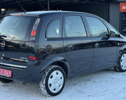 Черный Опель Мерива, объемом двигателя 1.6 л и пробегом 150 тыс. км за 5750 $, фото 8 на Automoto.ua